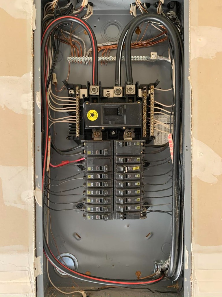Completed residential breaker panel with labeled circuits