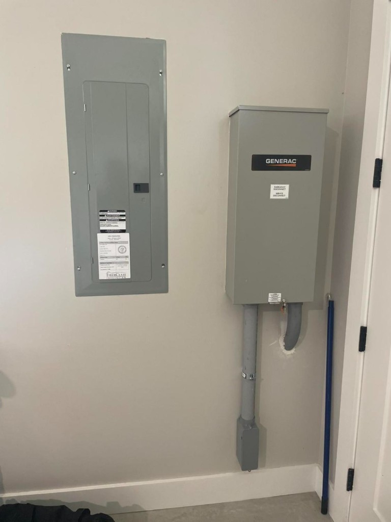 Indoor Generac emergency disconnect next to breaker panel